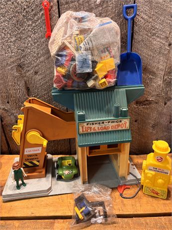 Fisher-Price Lift & Load Depot, Ghostbusters Toy, and Building Bricks
