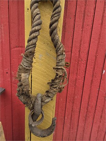 Vintage Industrial Forged Iron Cargo Hook with Heavy-Duty Weathered Rope